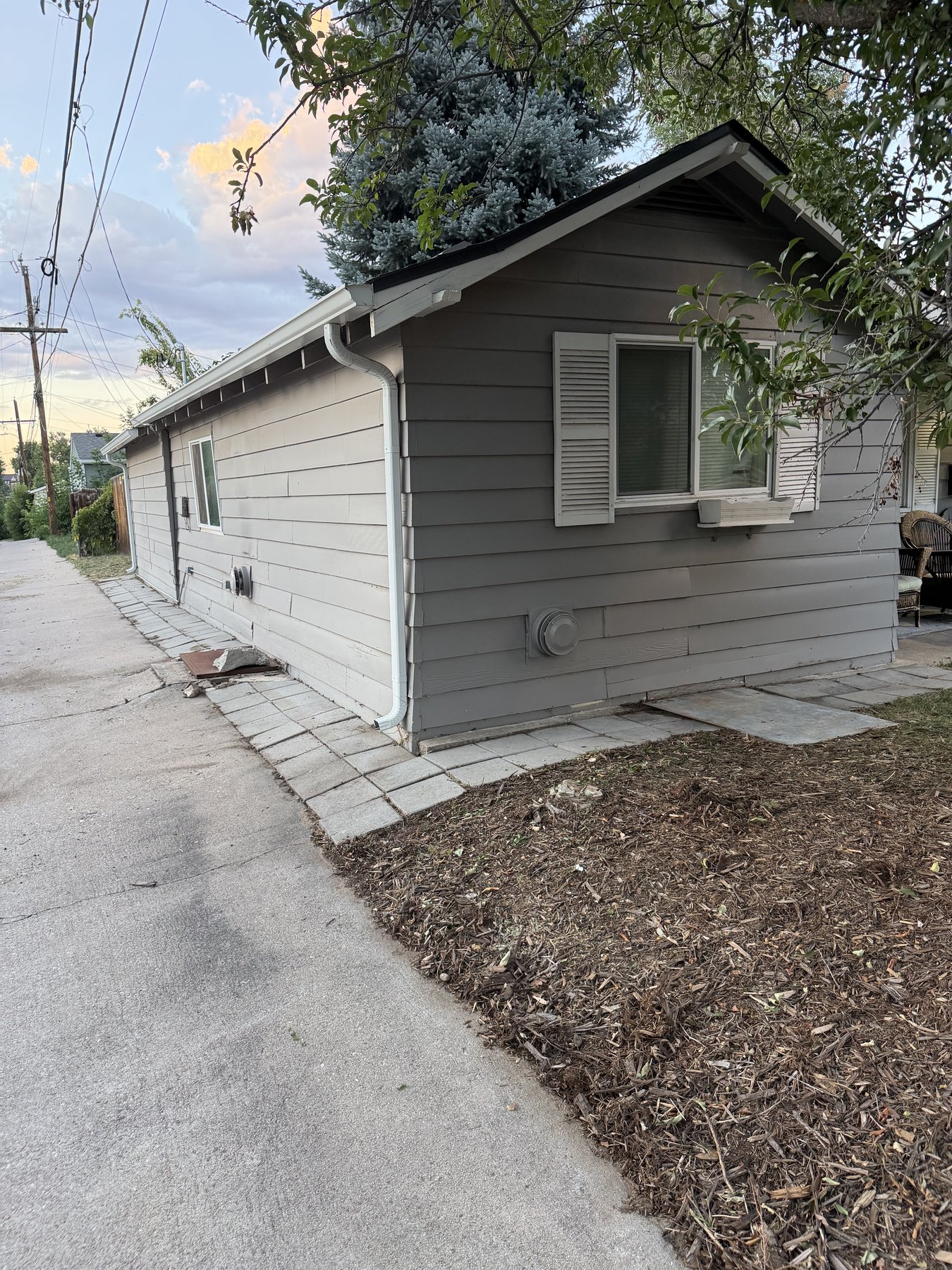 After: cleaned house foundation and walkway